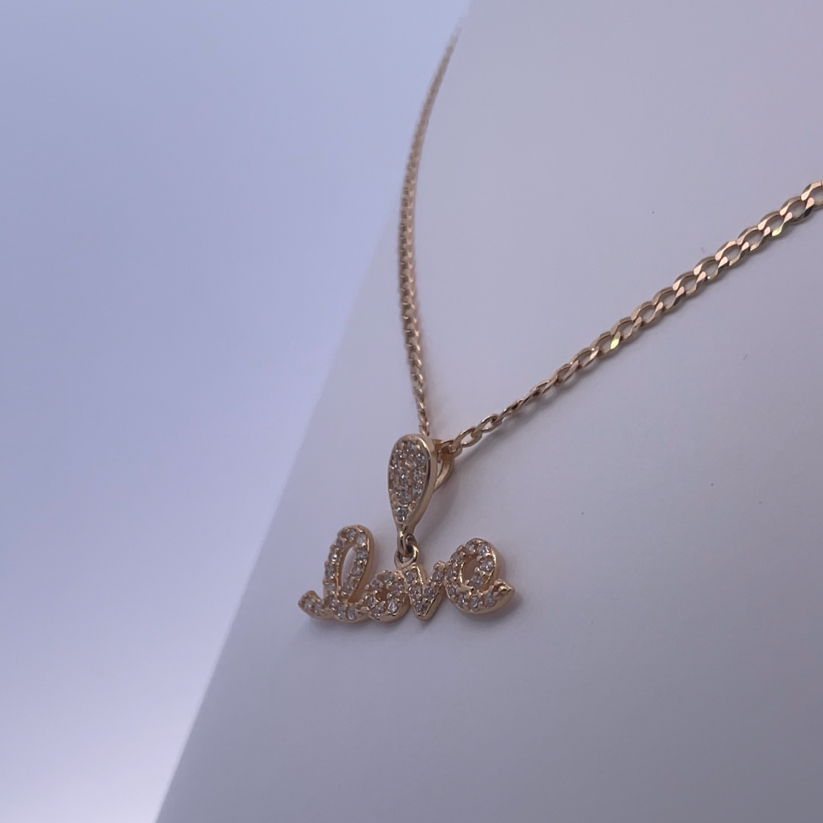 18K Yellow Gold LOVE Necklace – A Modern Twist on Romantic Jewelry