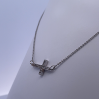 18K White Gold Sideways Cross Necklace – Contemporary Elegance with Diamond Accents