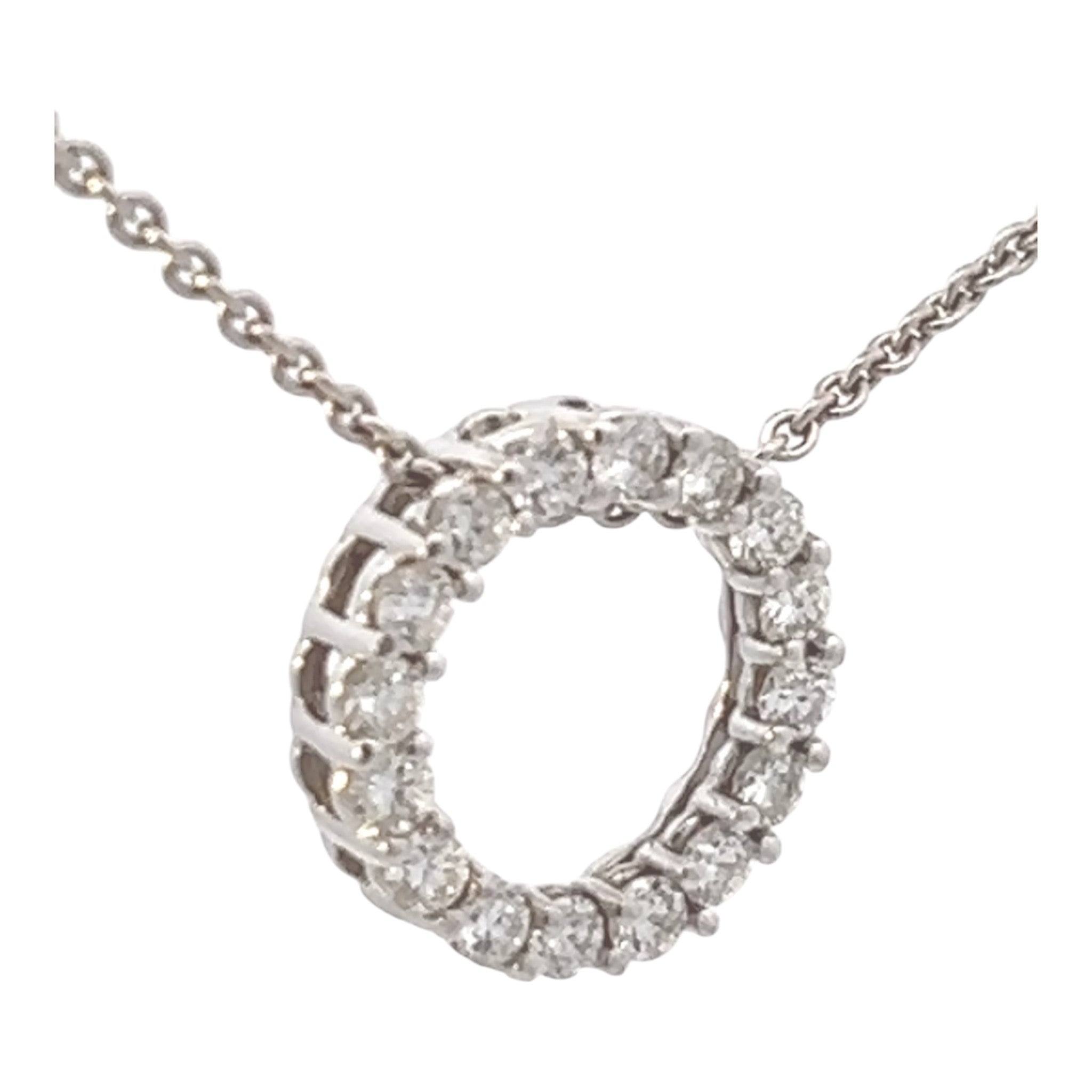 Timeless feelings. Diamond circle pendant, 18k white gold necklace.